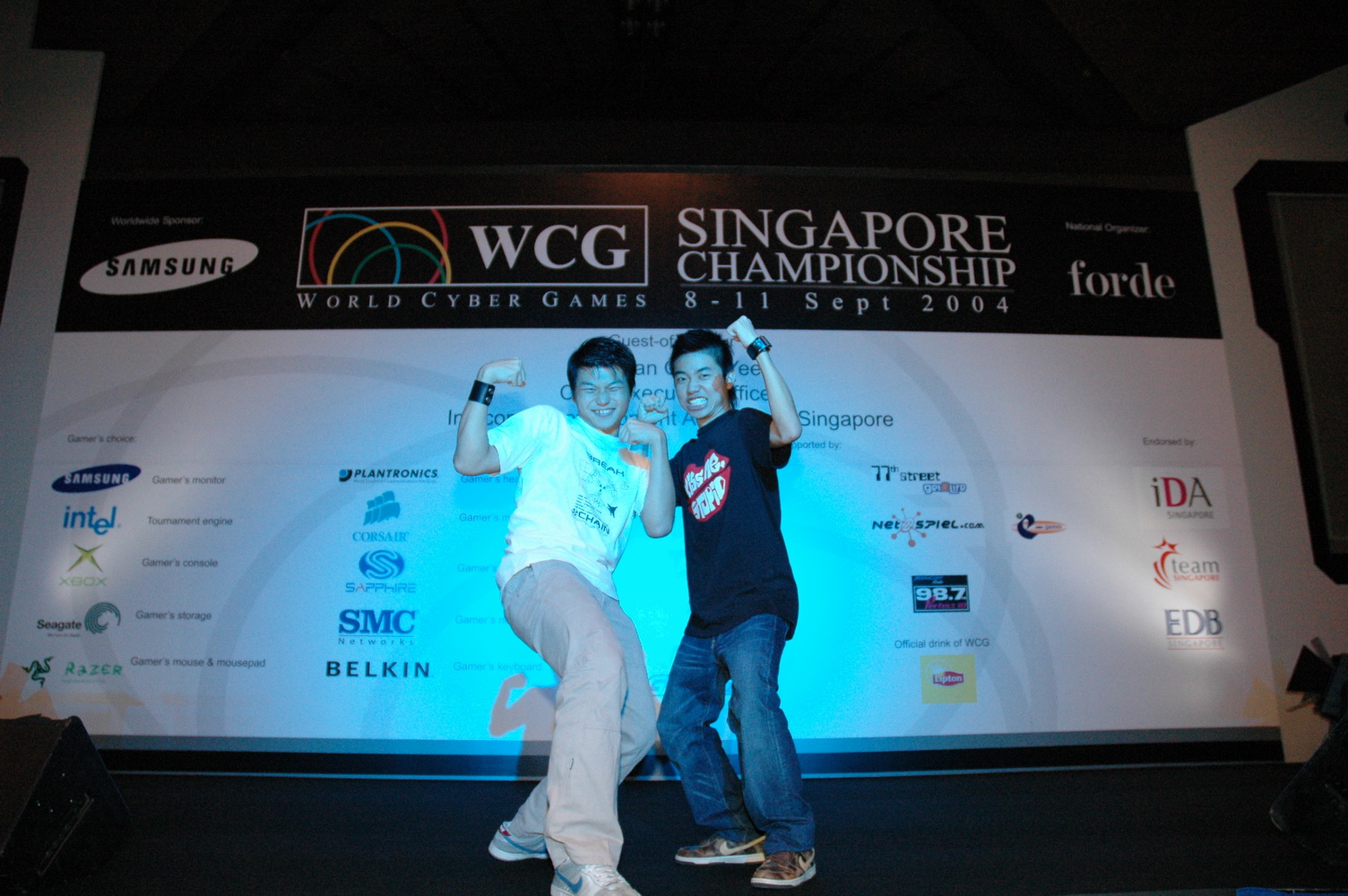 Bear and Stanley posing on the WCG Singapore Championship stage.